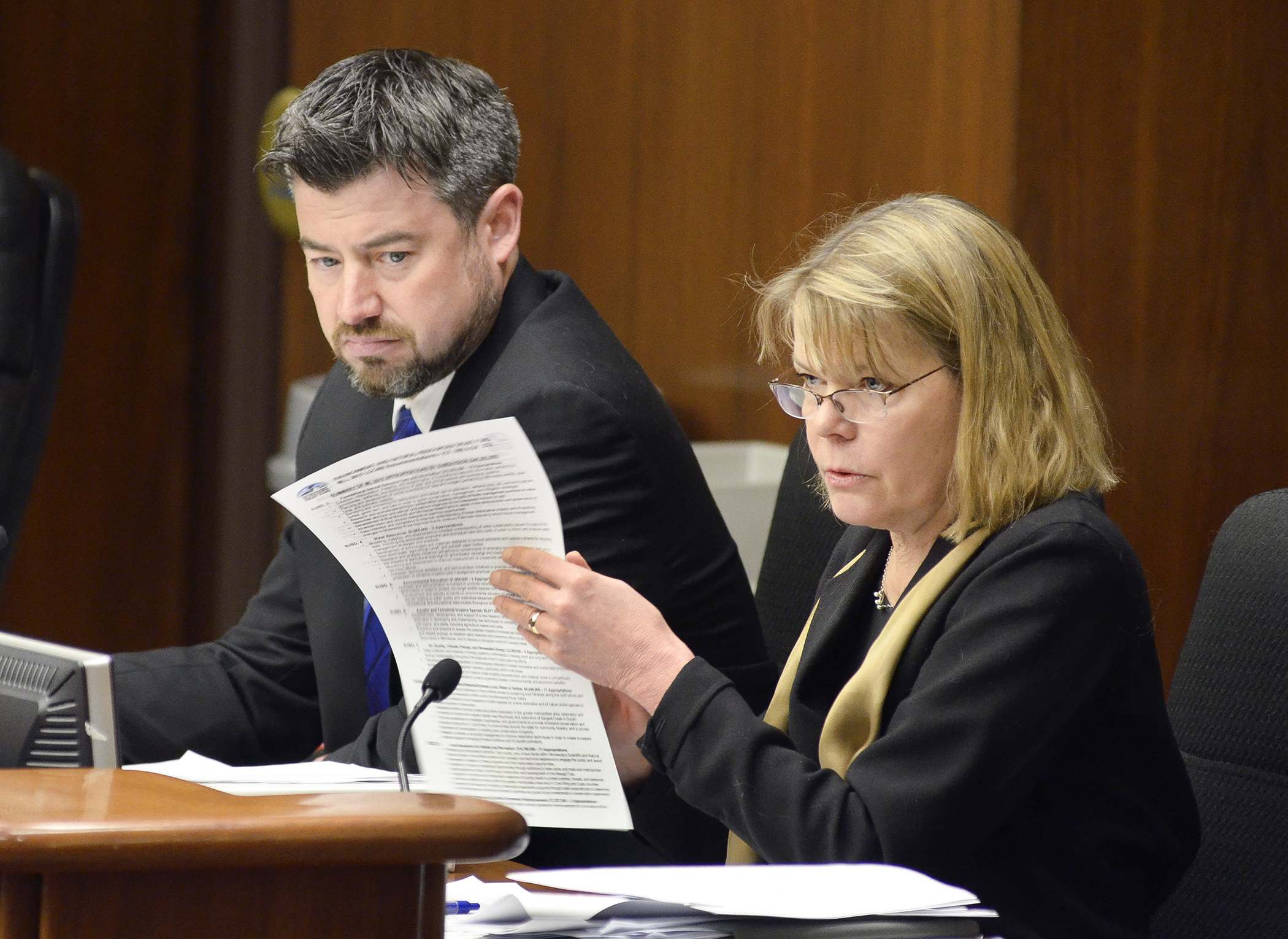 Legislative-Citizen Commission on Minnesota Resources Director Susan Thornton, right, and 
Assistant Director Mike Banker address the Jan. 29 meeting of the House Environment and Natural Resources Policy and Finance Committee.  Photo by Andrew VonBank
